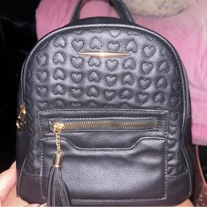 Elegant Black Heart-Embossed Women's Backpack